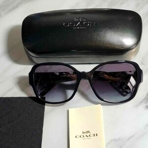 Women's authentic black Coach sunglasses